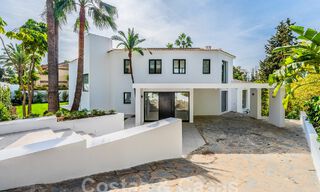 Spacious luxury villa for sale with a traditional architectural style located in a preferred residential area on the New Golden Mile, Marbella - Benahavis 55017 