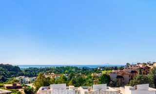 Move-in ready apartment for sale with sweeping views of the valley and sea in exclusive Marbella – Benahavis 55018 
