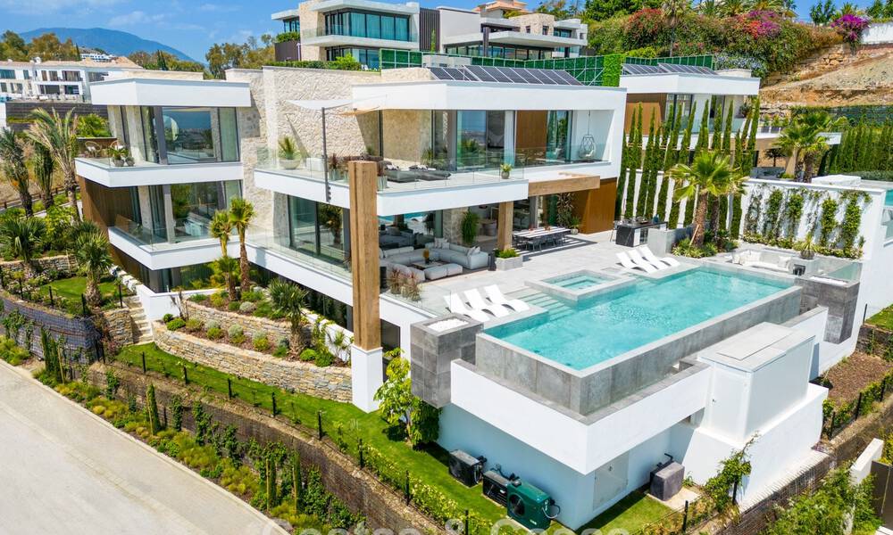 Stunning, architectural luxury villa for sale with open sea views in an elevated gated residential area in the hills of La Quinta in Marbella - Benahavis 54123