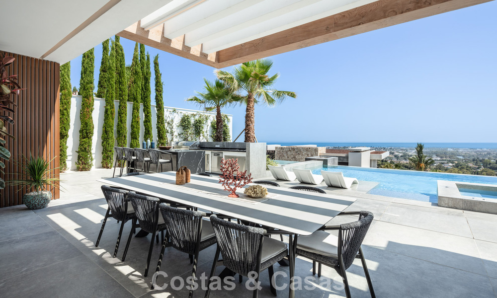 Stunning, architectural luxury villa for sale with open sea views in an elevated gated residential area in the hills of La Quinta in Marbella - Benahavis 54146