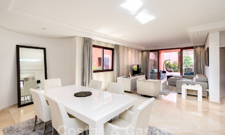 Luxury garden apartment for sale in a frontline beach complex on the New Golden Mile between Marbella and Estepona 55290 