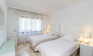 Luxury garden apartment for sale in a frontline beach complex on the New Golden Mile between Marbella and Estepona 55296 