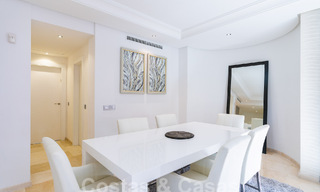 Luxury garden apartment for sale in a frontline beach complex on the New Golden Mile between Marbella and Estepona 55301 