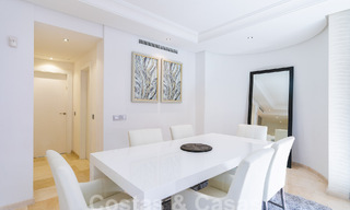 Luxury garden apartment for sale in a frontline beach complex on the New Golden Mile between Marbella and Estepona 55301 
