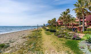 Luxury garden apartment for sale in a frontline beach complex on the New Golden Mile between Marbella and Estepona 55311 