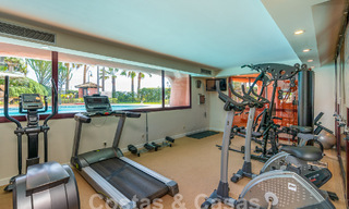 Luxury garden apartment for sale in a frontline beach complex on the New Golden Mile between Marbella and Estepona 55313 