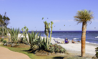 Luxury garden apartment for sale in a frontline beach complex on the New Golden Mile between Marbella and Estepona 55315 