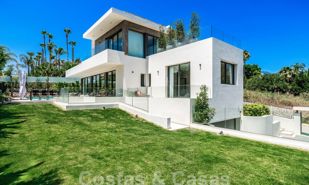 Spacious contemporary luxury villa located on frontline golf with views of La Concha mountain in Nueva Andalucia, Marbella 55558