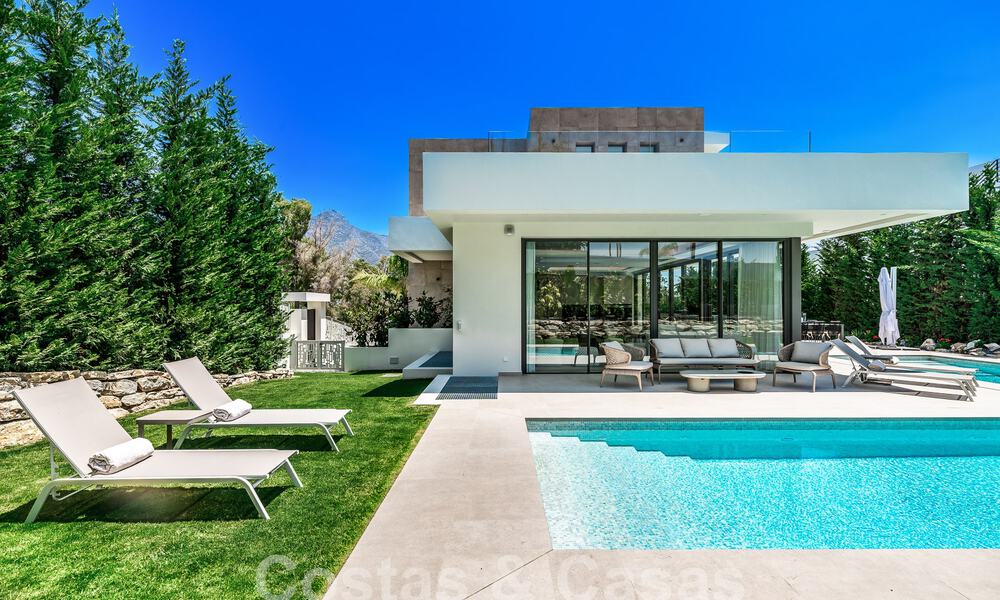 Spacious contemporary luxury villa located on frontline golf with views of La Concha mountain in Nueva Andalucia, Marbella 55559