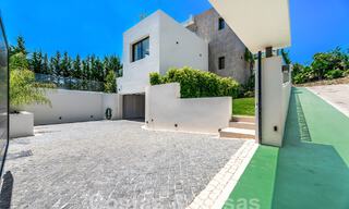 Spacious contemporary luxury villa located on frontline golf with views of La Concha mountain in Nueva Andalucia, Marbella 55562 
