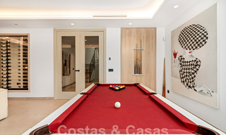 Spacious contemporary luxury villa located on frontline golf with views of La Concha mountain in Nueva Andalucia, Marbella 55573 