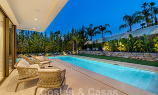Spacious contemporary luxury villa located on frontline golf with views of La Concha mountain in Nueva Andalucia, Marbella 55575 