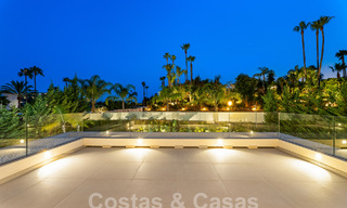 Spacious contemporary luxury villa located on frontline golf with views of La Concha mountain in Nueva Andalucia, Marbella 55577 