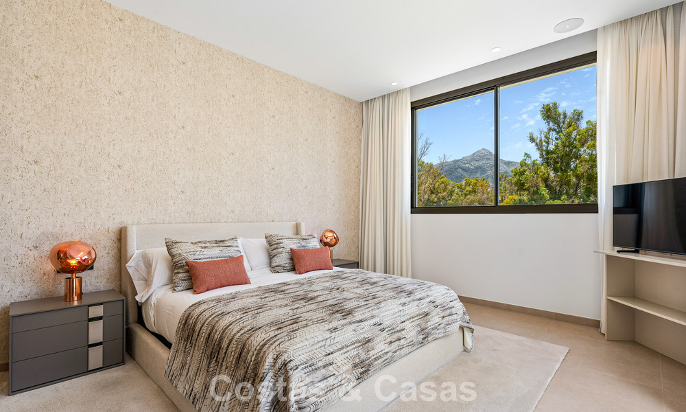 Spacious contemporary luxury villa located on frontline golf with views of La Concha mountain in Nueva Andalucia, Marbella 786398
