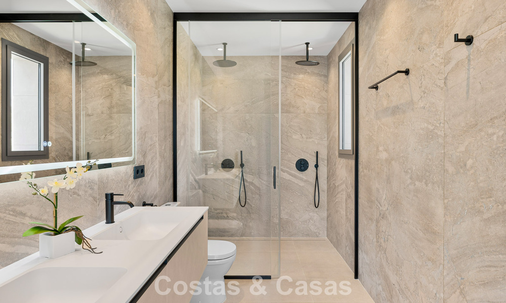 Spacious contemporary luxury villa located on frontline golf with views of La Concha mountain in Nueva Andalucia, Marbella 786399