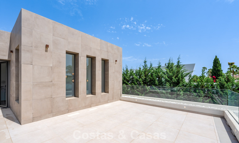 Spacious contemporary luxury villa located on frontline golf with views of La Concha mountain in Nueva Andalucia, Marbella 786403