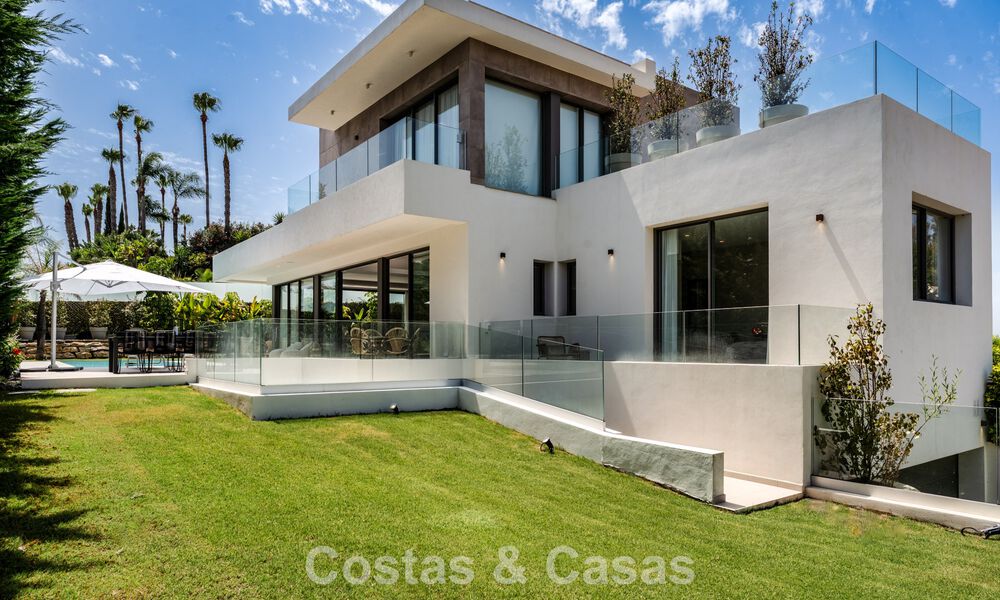 Spacious contemporary luxury villa located on frontline golf with views of La Concha mountain in Nueva Andalucia, Marbella 786411