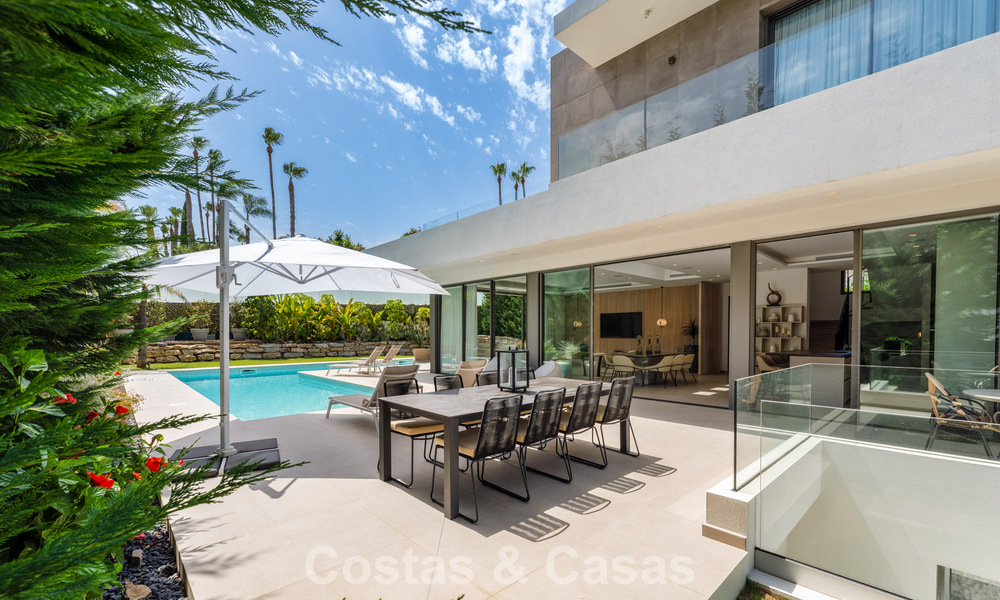Spacious contemporary luxury villa located on frontline golf with views of La Concha mountain in Nueva Andalucia, Marbella 786412