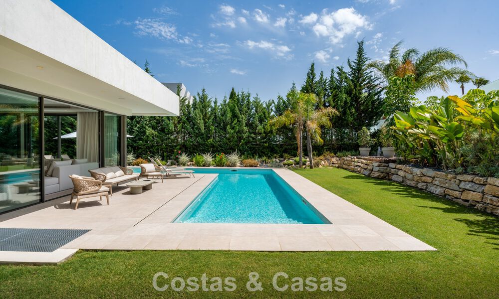 Spacious contemporary luxury villa located on frontline golf with views of La Concha mountain in Nueva Andalucia, Marbella 786413
