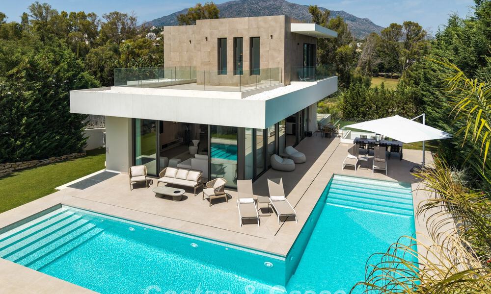 Spacious contemporary luxury villa located on frontline golf with views of La Concha mountain in Nueva Andalucia, Marbella 786416