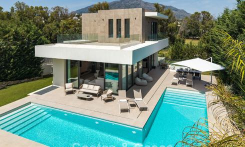 Spacious contemporary luxury villa located on frontline golf with views of La Concha mountain in Nueva Andalucia, Marbella 786416