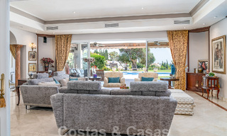 Stately luxury Andalusian-style mansion with sea views in Nueva Andalucia's golf valley, Marbella 55656 