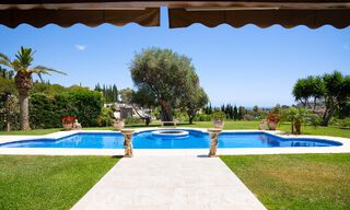 Stately luxury Andalusian-style mansion with sea views in Nueva Andalucia's golf valley, Marbella 55661 
