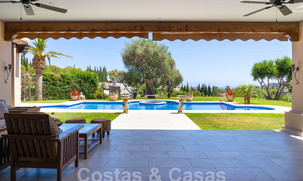 Stately luxury Andalusian-style mansion with sea views in Nueva Andalucia's golf valley, Marbella 55662