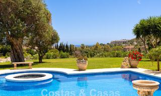 Stately luxury Andalusian-style mansion with sea views in Nueva Andalucia's golf valley, Marbella 55666 