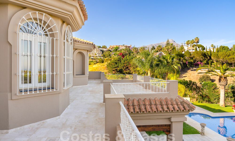 Stately luxury Andalusian-style mansion with sea views in Nueva Andalucia's golf valley, Marbella 55677