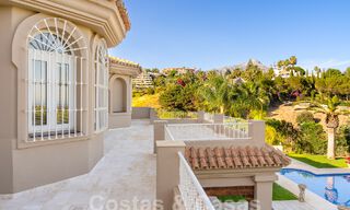 Stately luxury Andalusian-style mansion with sea views in Nueva Andalucia's golf valley, Marbella 55677 