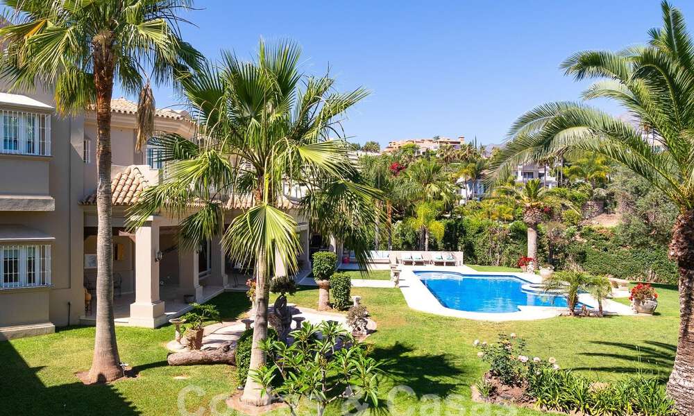 Stately luxury Andalusian-style mansion with sea views in Nueva Andalucia's golf valley, Marbella 55716