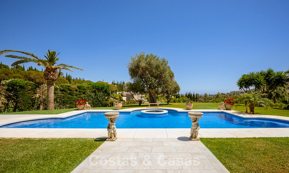 Stately luxury Andalusian-style mansion with sea views in Nueva Andalucia's golf valley, Marbella 779151