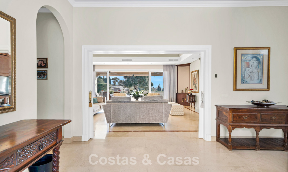 Stately luxury Andalusian-style mansion with sea views in Nueva Andalucia's golf valley, Marbella 779157