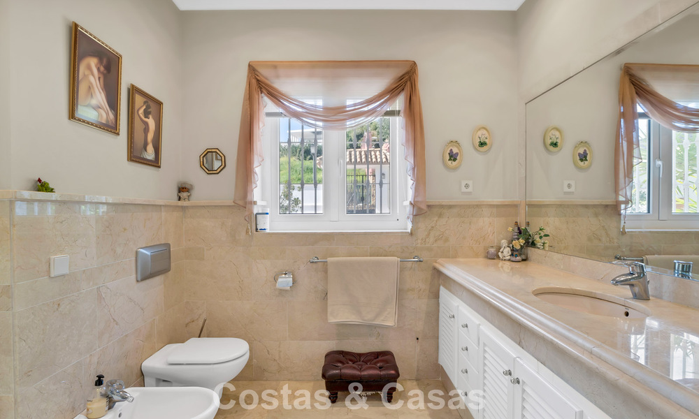 Stately luxury Andalusian-style mansion with sea views in Nueva Andalucia's golf valley, Marbella 779162