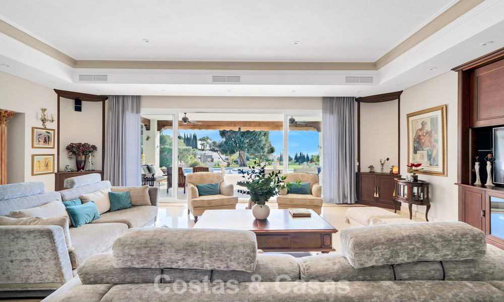 Stately luxury Andalusian-style mansion with sea views in Nueva Andalucia's golf valley, Marbella 779163