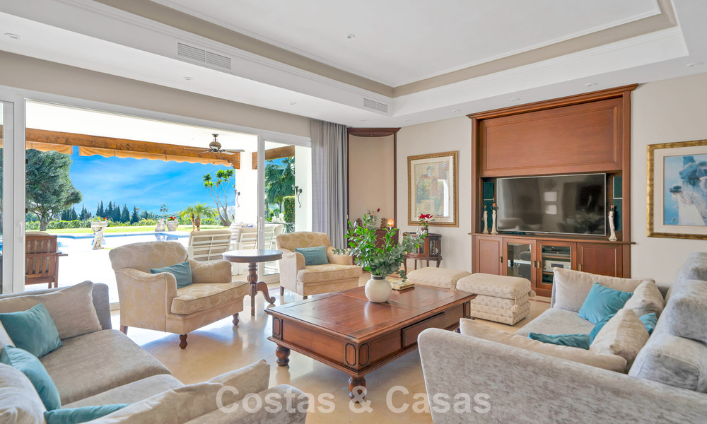 Stately luxury Andalusian-style mansion with sea views in Nueva Andalucia's golf valley, Marbella 779164