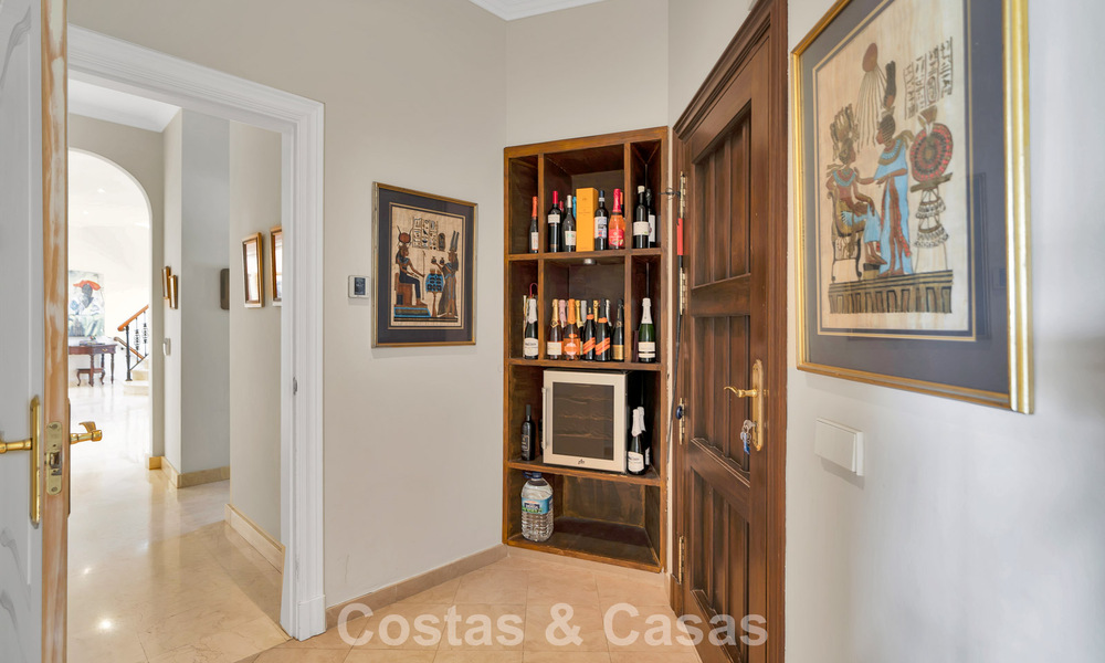 Stately luxury Andalusian-style mansion with sea views in Nueva Andalucia's golf valley, Marbella 779171