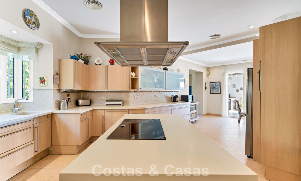 Stately luxury Andalusian-style mansion with sea views in Nueva Andalucia's golf valley, Marbella 779172