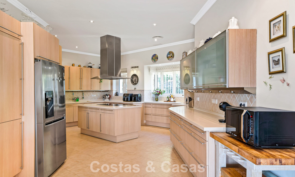 Stately luxury Andalusian-style mansion with sea views in Nueva Andalucia's golf valley, Marbella 779173