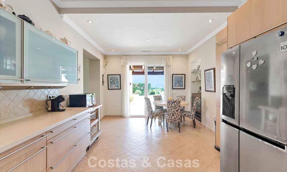 Stately luxury Andalusian-style mansion with sea views in Nueva Andalucia's golf valley, Marbella 779175