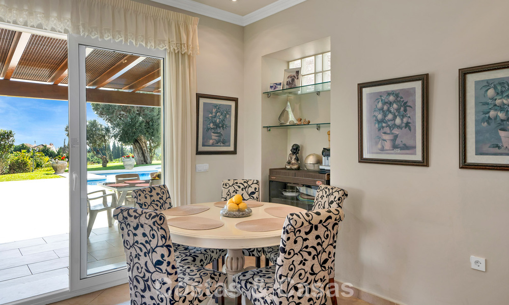 Stately luxury Andalusian-style mansion with sea views in Nueva Andalucia's golf valley, Marbella 779178