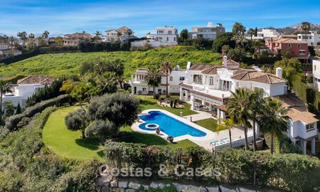 Stately luxury Andalusian-style mansion with sea views in Nueva Andalucia's golf valley, Marbella 779179