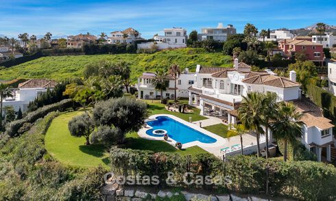 Stately luxury Andalusian-style mansion with sea views in Nueva Andalucia's golf valley, Marbella 779179