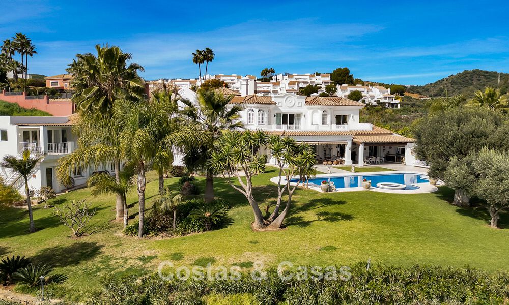 Stately luxury Andalusian-style mansion with sea views in Nueva Andalucia's golf valley, Marbella 779182