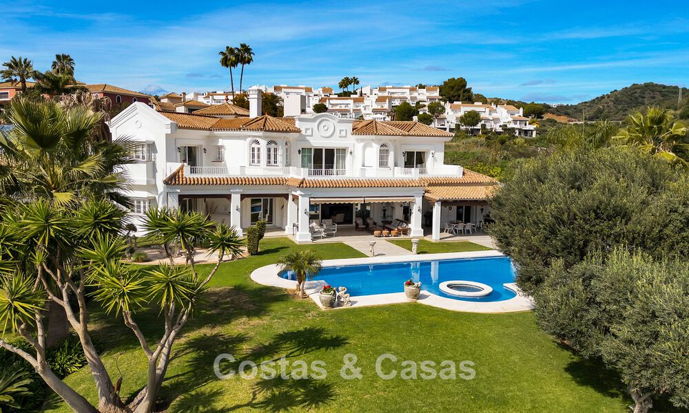 Stately luxury Andalusian-style mansion with sea views in Nueva Andalucia's golf valley, Marbella 779183