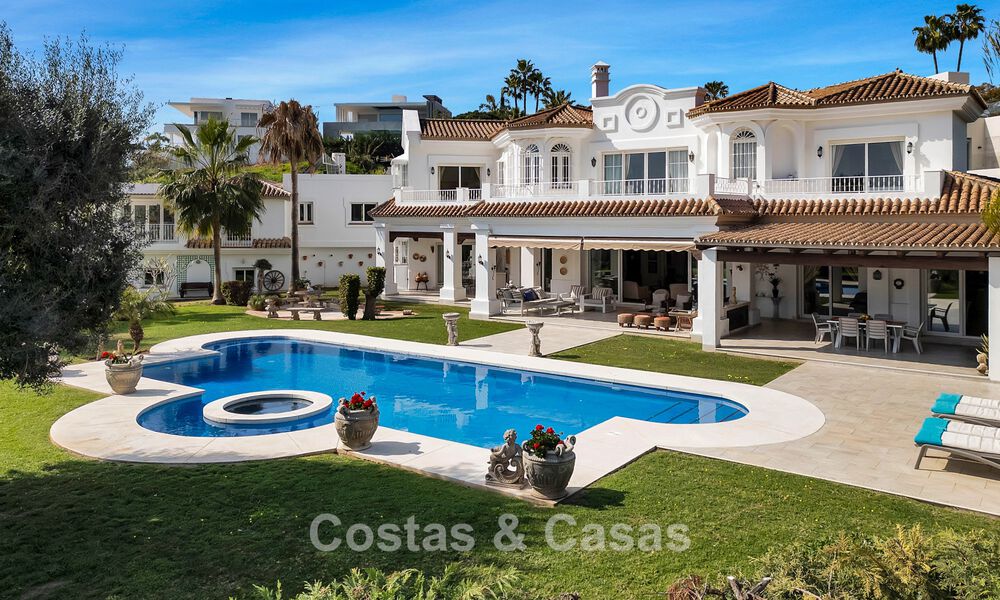 Stately luxury Andalusian-style mansion with sea views in Nueva Andalucia's golf valley, Marbella 779184