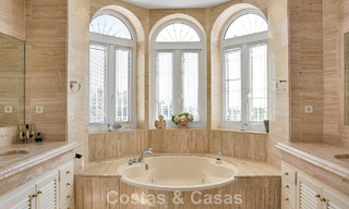 Stately luxury Andalusian-style mansion with sea views in Nueva Andalucia's golf valley, Marbella 779189 