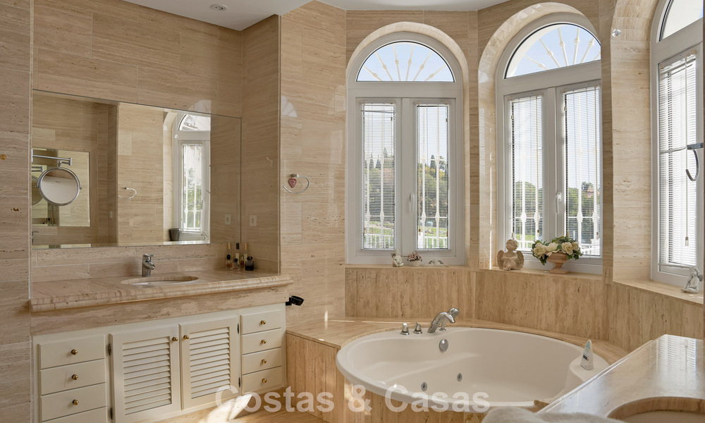 Stately luxury Andalusian-style mansion with sea views in Nueva Andalucia's golf valley, Marbella 779190