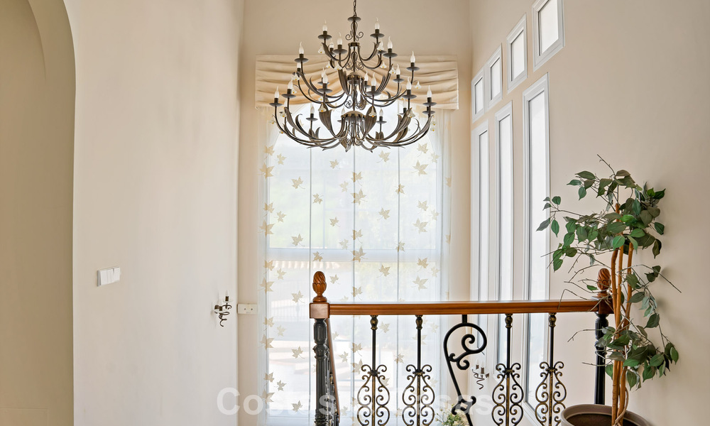 Stately luxury Andalusian-style mansion with sea views in Nueva Andalucia's golf valley, Marbella 779191